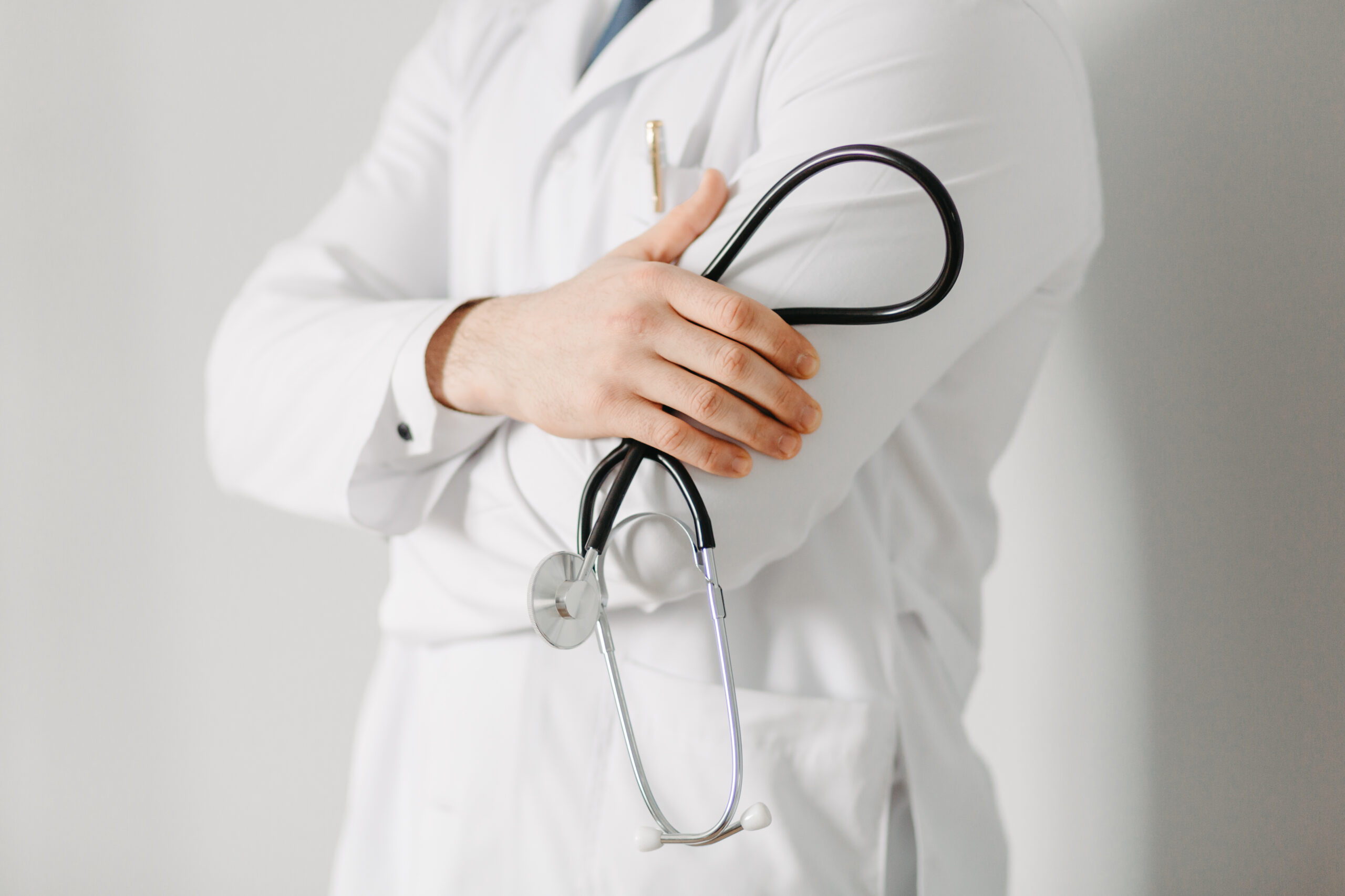 Portrait friendly doctor isolated gray 1 scaled.jpg